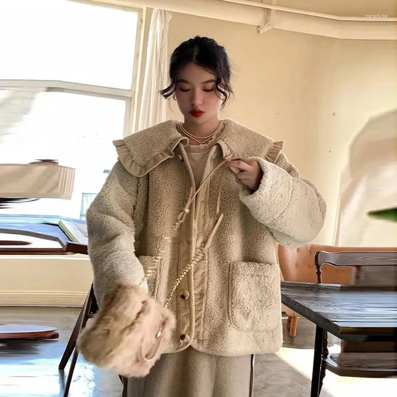 Veste élégante à col volanté pour femme