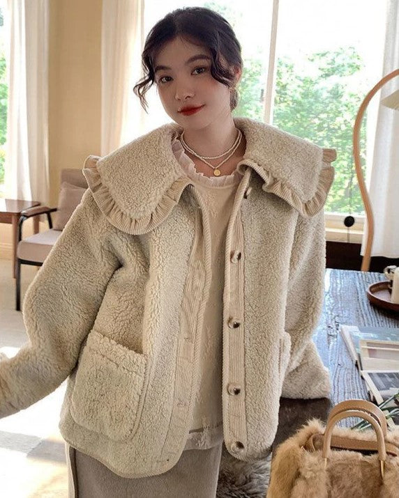 Veste élégante à col volanté pour femme