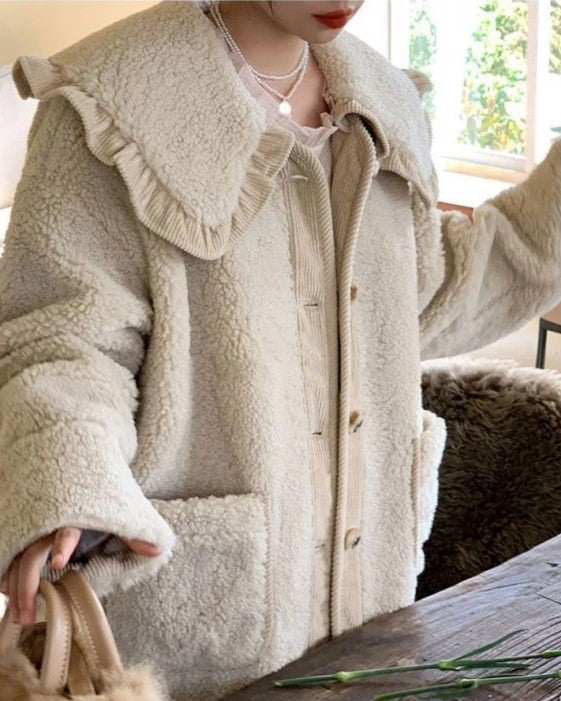 Veste élégante à col volanté pour femme