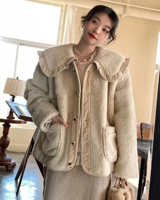 Veste élégante à col volanté pour femme