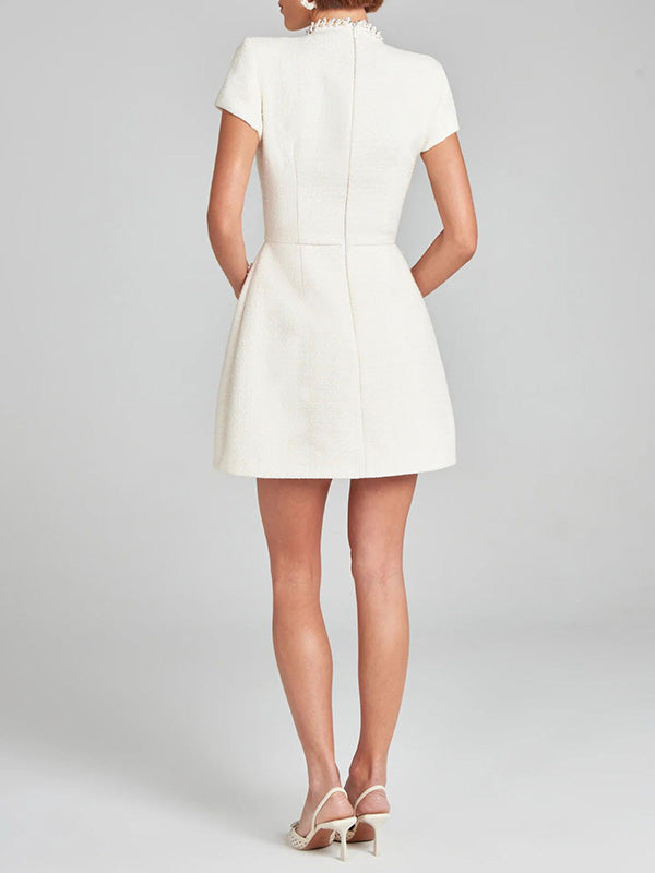 Robe mini en tweed luxe avec perles - Élégance et raffinement - Projet Paris - Parfaite pour les occasions spéciales